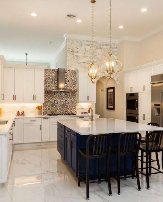 Beautiful luxury home kitchen with white cabinets.